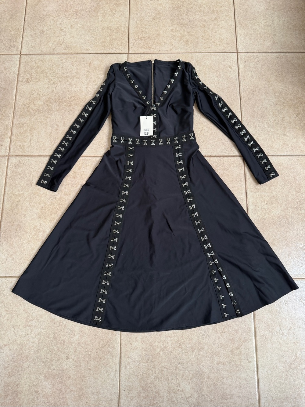 Carolina D. black midi dress features metallic hook-and-eye